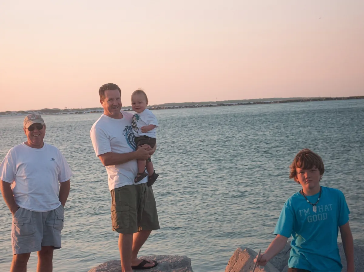 Family by the shore at dusk